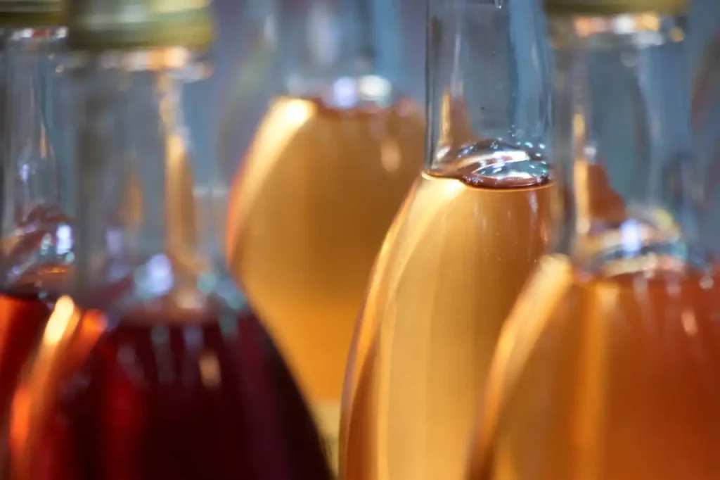 Extreme close up bottles with colored liquid 2024 09 14 10 04 41 utc